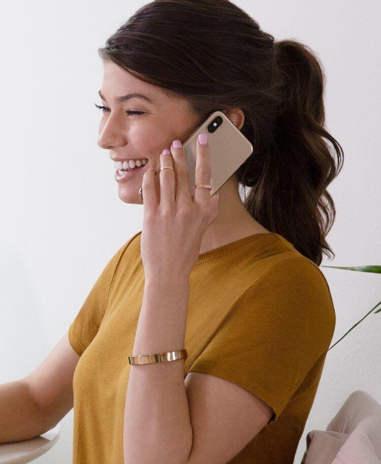 a woman talking through the phone