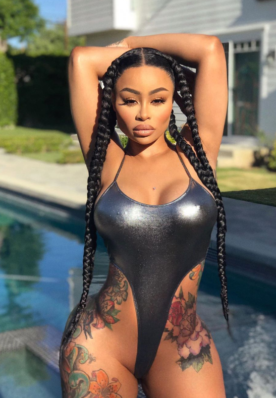 Highest Paid OnlyFans Creators named Blac Chyna standing wearing bikini near a pool