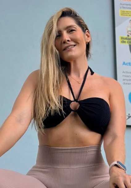 Yoryi Arboleda smiling to camera in sexy bra and pants