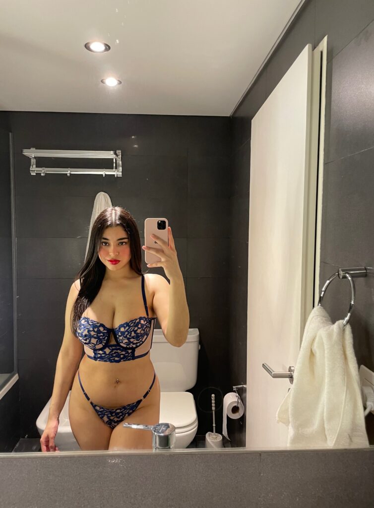 Hot mirror picture of Angelina Sweetie wearing a blue sexy lingerie 