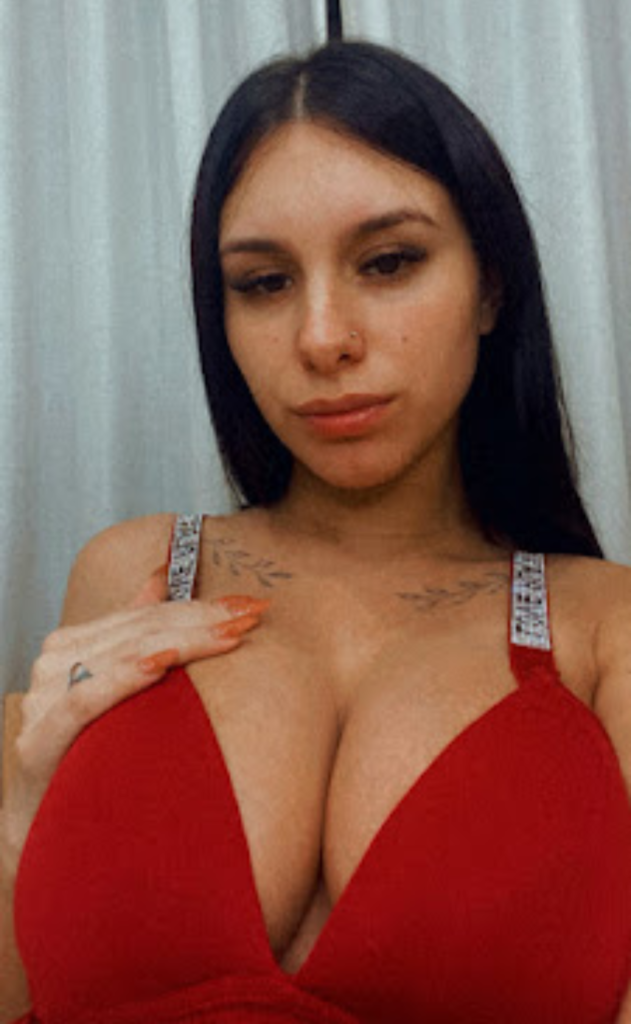 Free OnlyFans account Vanessa takes a sexy selfie in hot red lingerie 