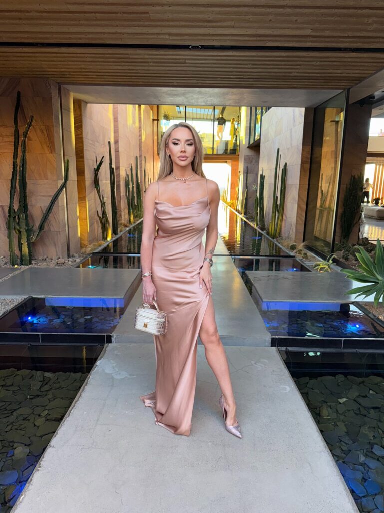 Claudia Fijal OnlyFans blonde model wearing pink dress