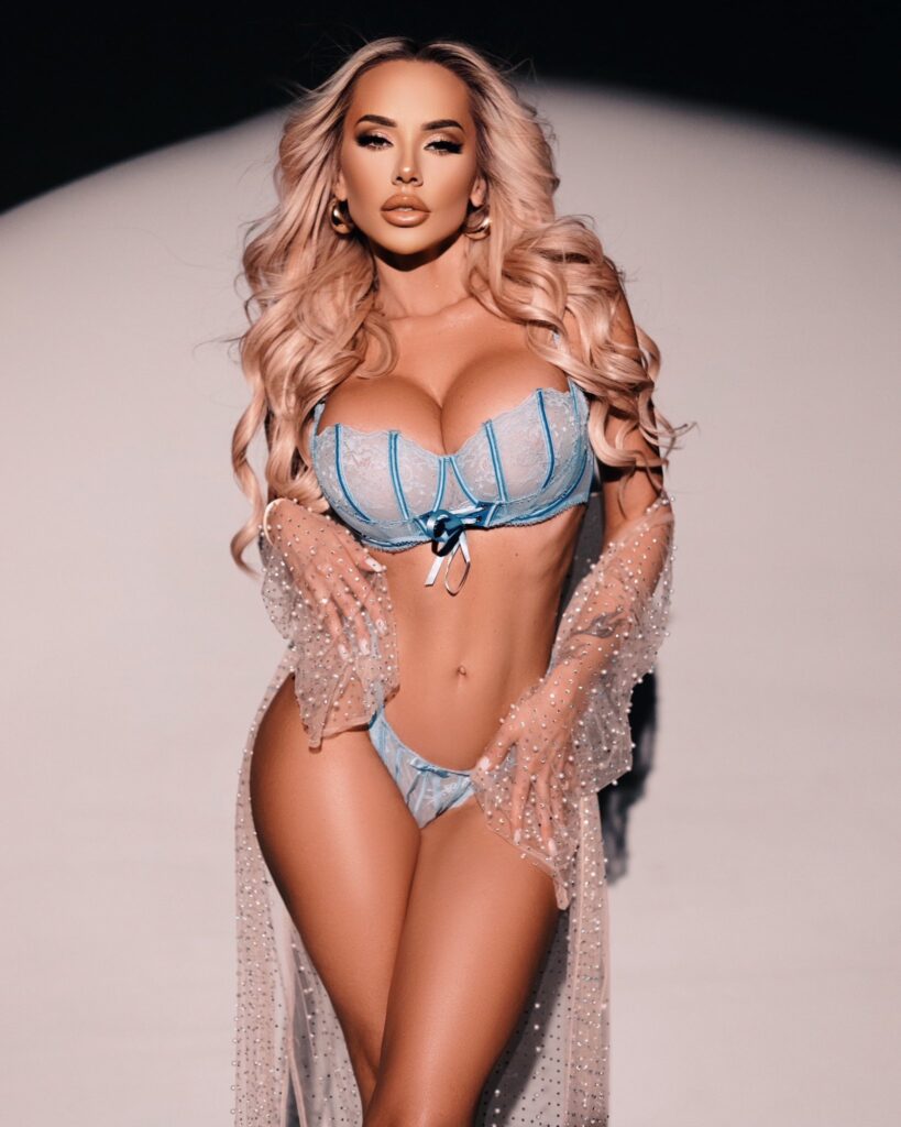 Claudia Fijal OnlyFans blonde model wearing blue bikini