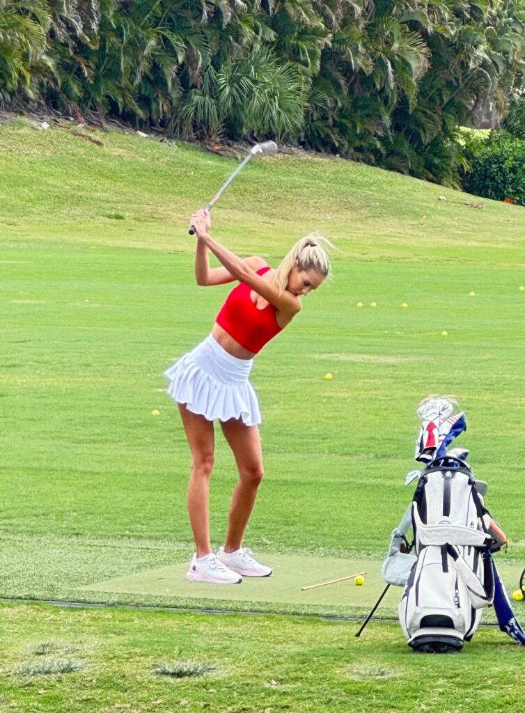 Bri Teresi @briteresi OnlyFans blonde model wearing red top and white mini skirt