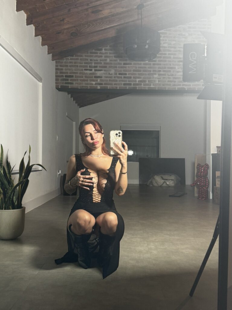 Luchi Del Mar OnlyFans big tits model wearing black dress
