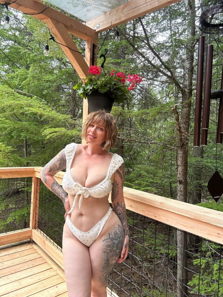 Vicky Aisha @vickyaisha OnlyFans tatted big tits model wearing white two piece