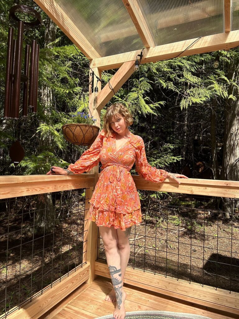 Vicky Aisha @vickyaisha OnlyFans tatted big tits model wearing sexy orange dress