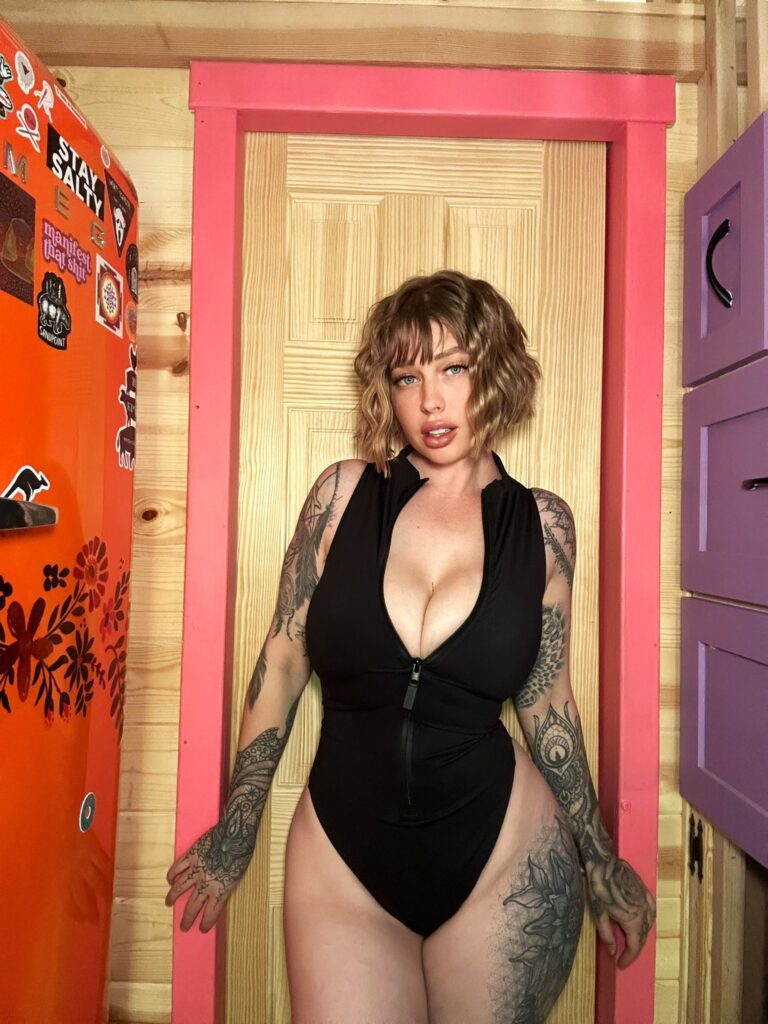Vicky Aisha @vickyaisha OnlyFans tatted big tits model wearing black one piece