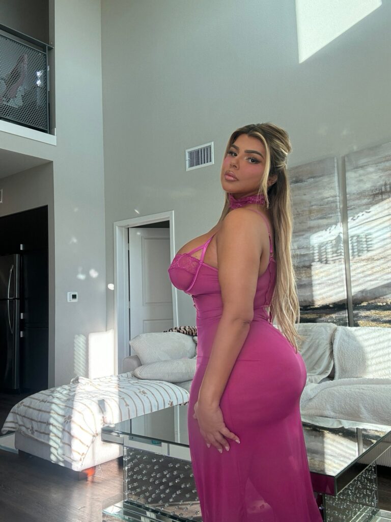 Shell Raven OnlyFans chubby model wearing purple dress