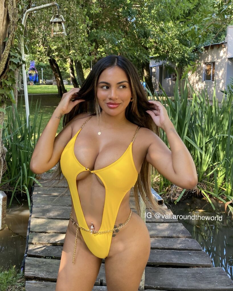 Val Cortez OnlyFans big tits model wearing yellow one piece bikini
